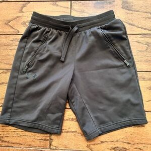 Under Armour  youth Medium. Color is dark green.